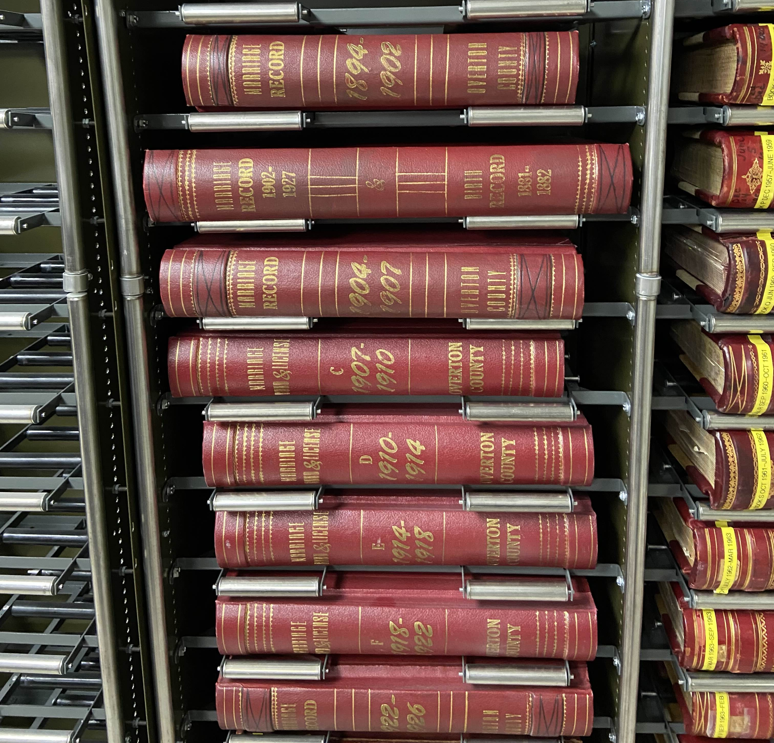 A photo of marriage record books in the archives.